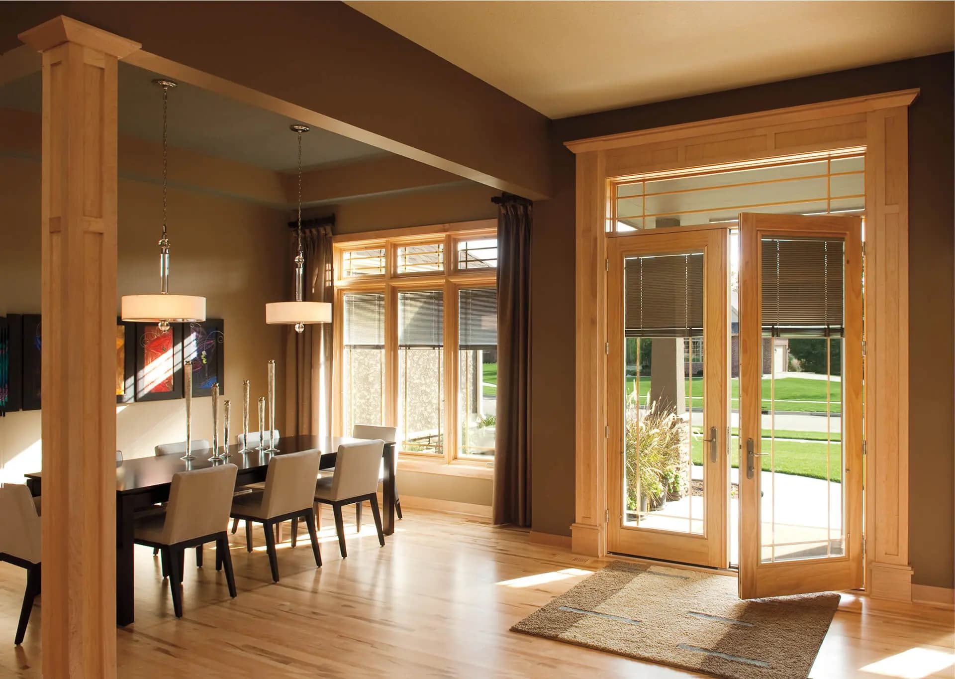 Hinged french patio doors opening from a dining room to a back garden